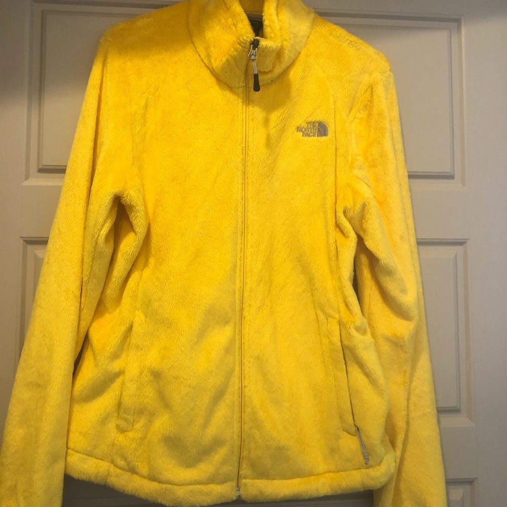 Bright yellow north face jacket